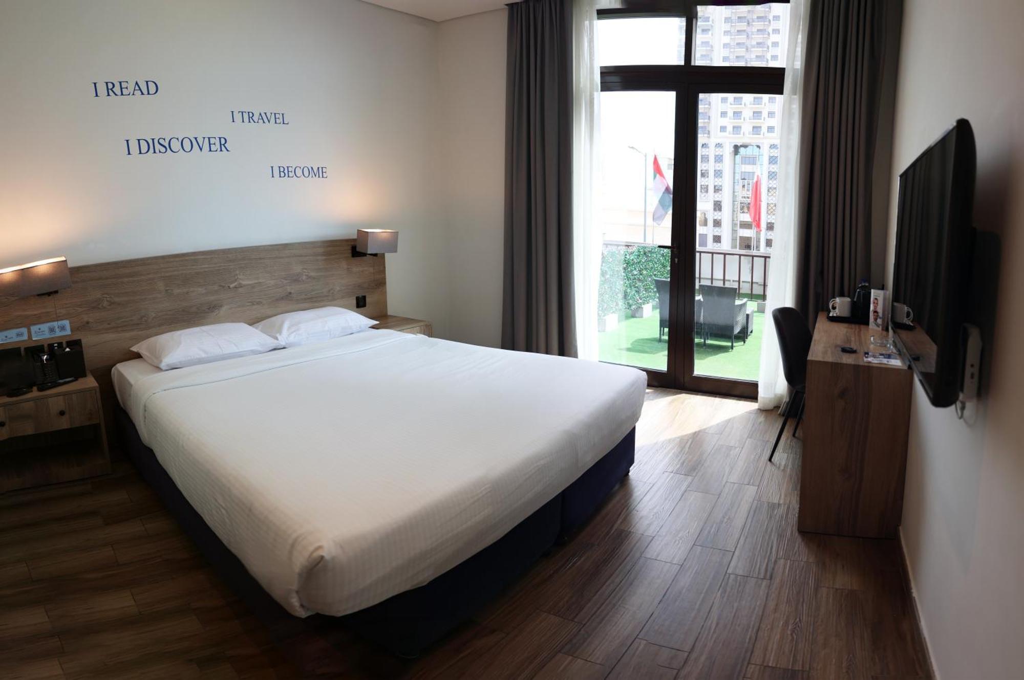 Kingsgate Al Jaddaf Hotel By Millennium Дубай Екстериор снимка